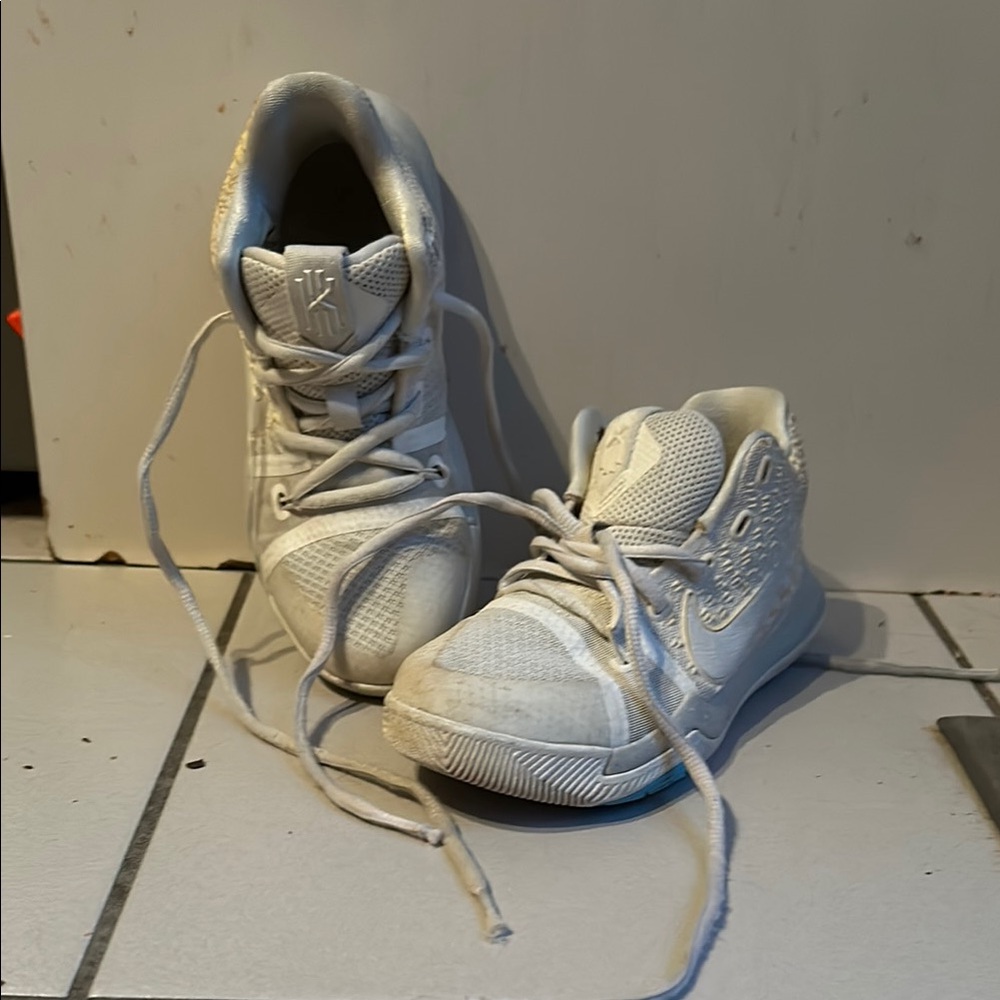 White kids Nike shoes